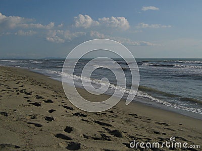 Beach, rough seas, clear skies,Forte dei Marmi, Lucca, Italy Stock Photo