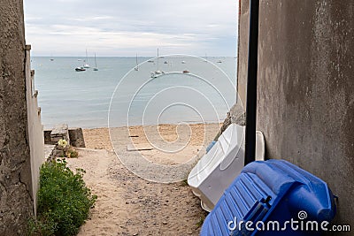 Beach sand access alley on the isle of Noirmoutier with view on the sea Stock Photo