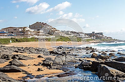 Beach Sand Rocks Against Blue Sky City Skyline Editorial Stock Photo