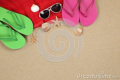 Beach scene in summer on vacation with sand, sunglasses, towel a Stock Photo