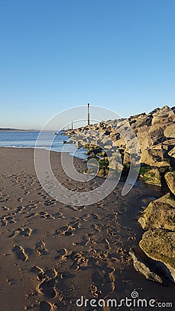 Beach at Sea Palling with rocks Stock Photo