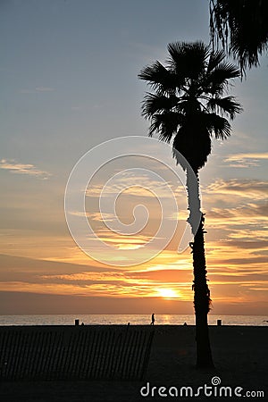 Beach with setting sun Stock Photo