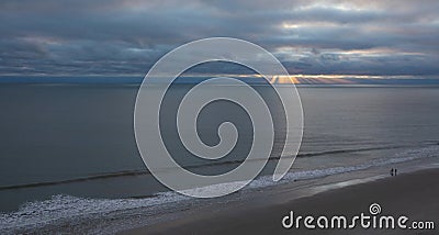 Beach stroll at Myrtle Beach at sunrise Stock Photo