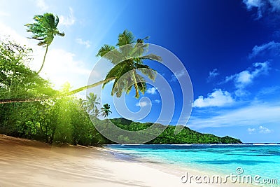 Beach in sunset time on Mahe island in Seychelles Stock Photo
