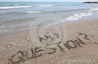 beach text ANY QUESTION ideal to complement a slide presentatio Stock Photo