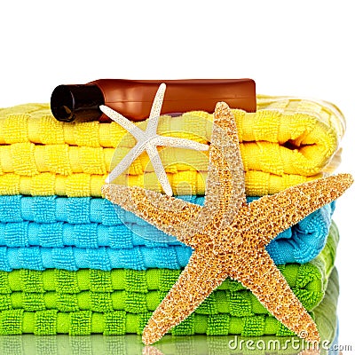 Beach Towels With Starfish And Sunscreen Stock Photo