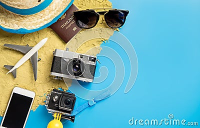 Beach travel object and gadgets for Vacation Traveler on blue copy space Stock Photo