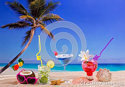 Beach tropical cocktails on white sand mojito blue hawaii Stock Photo