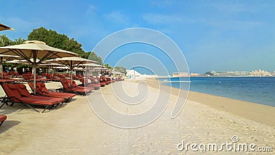 Beach with umbrellas in Ras al Khaimah. September 2018 Stock Photo