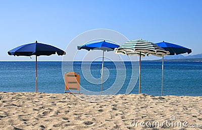 Beach umbrellas on the seaside Stock Photo