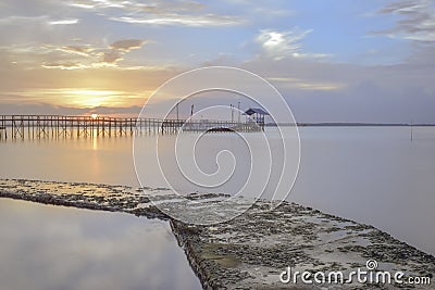 Beach under the beautiful sunset landscape Stock Photo