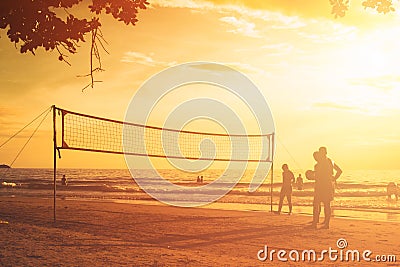 Beach volley at sunset Stock Photo