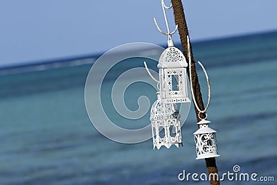 Beach wedding lantern setup with space for text Stock Photo