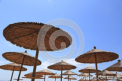 Beach wicker umbrella tops Stock Photo