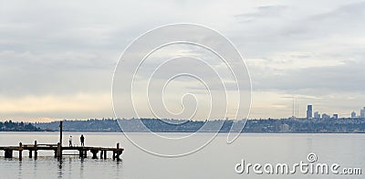 Beachgoers at Kirkland Marina pier Stock Photo