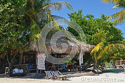 Beachside Coconut leaf hut cafe Editorial Stock Photo