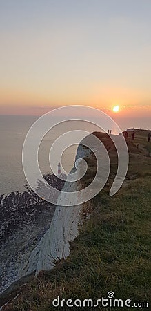 Beachy head lighthouse Eastbourne Sussex sunset Stock Photo