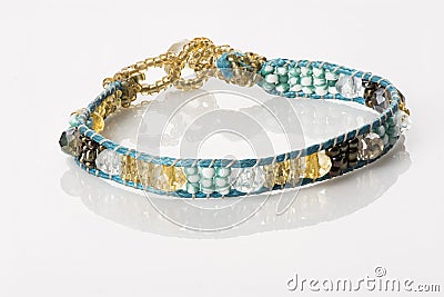 Beaded Bracelet - Turquoise & Gold Stock Photo