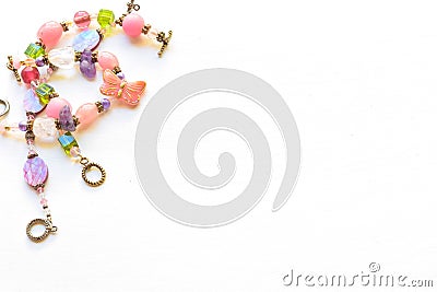 Beaded bracelets on white background with copyspace Stock Photo