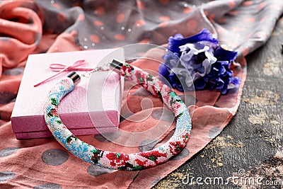 Beaded necklace with gift wrapping Stock Photo