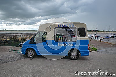 Beadnell, UK - 12 July, 2023: Ice Cream van on Beadnell beach, Northumbria Editorial Stock Photo