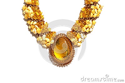 Beads with amber, brooch, bright colorful pieces of amber Stock Photo