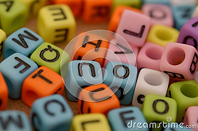 The beads can be used as a tool for learning the alphabet, spelling, and reading, symbolizing the foundation of education Stock Photo