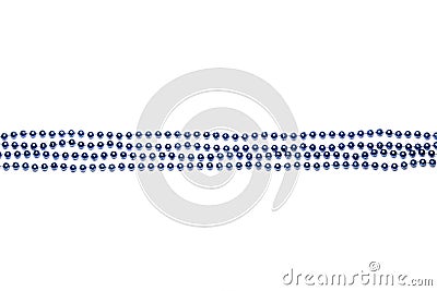 Beads laid out in straight rows on Mardi Gras blue on white background Stock Photo