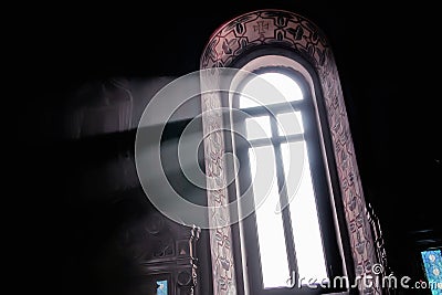 A beam of light through the window in the church Stock Photo