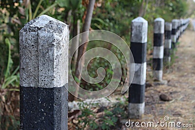 Beam-shaped road dividers in black and white Stock Photo