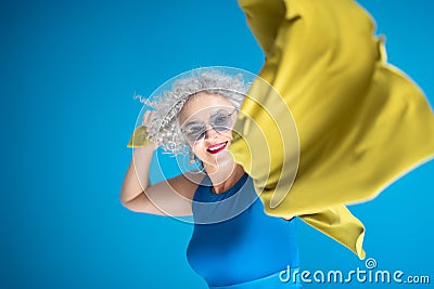 Beaming mature pretty woman smiling while posing Stock Photo