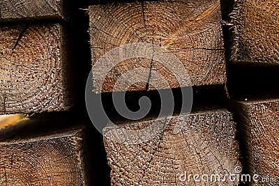 Beams end building material close-up part center frame background base light beige brown Stock Photo