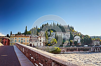 Beams morning sun bridge Ponto Pietra river Adige Italy Verona Stock Photo