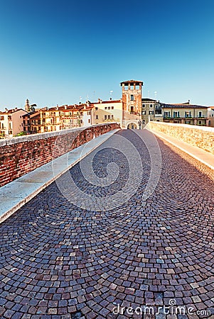 Beams morning sun bridge Ponto Pietra river Adige Italy Verona Stock Photo