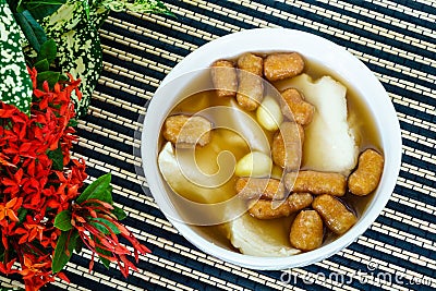 Bean junket eaten hot with gingered sirup Stock Photo