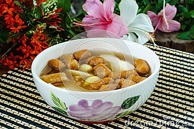 Bean junket eaten hot with gingered sirup, Ginkgo nuts, and mini Stock Photo