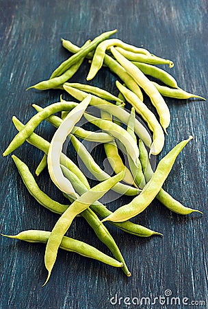 Bean pods on the dark table. Stock Photo