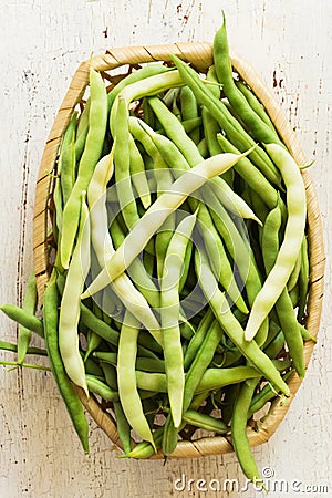 Bean pods on the white table. Stock Photo