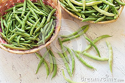 Bean pods in wicker baskets. Stock Photo