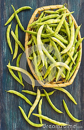 Bean pods in wicker baskets. Stock Photo