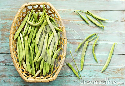 Bean pods in wicker baskets. Stock Photo