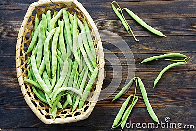 Bean pods in wicker baskets. Stock Photo