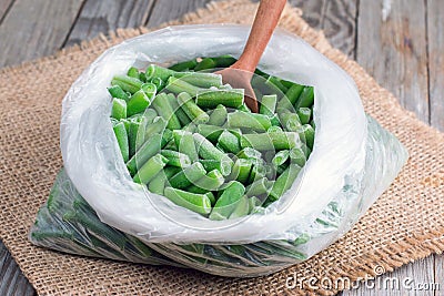 Beans frozen asparagus. Bags with frozen vegetables Stock Photo