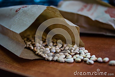 Beans in paper bag Stock Photo