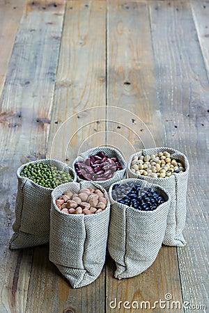 Beans on wooden boards Stock Photo