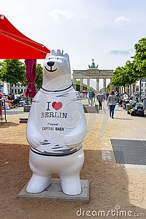 Bear with inscription `I love Berlin` and Brandenburg gate at background, Berlin, Germany Editorial Stock Photo