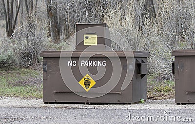 Bear proof trash can on roadside Editorial Stock Photo