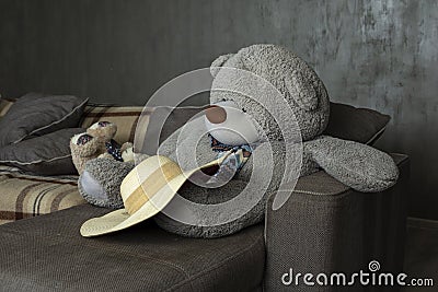 The bear was thrown by the hostess, the bear became sad Stock Photo