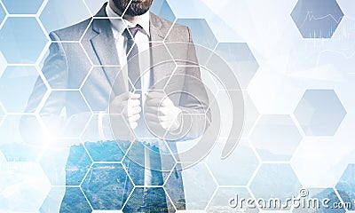 Bearded businessman, hills and graphs Stock Photo