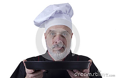 Bearded chef with tray in hands Stock Photo